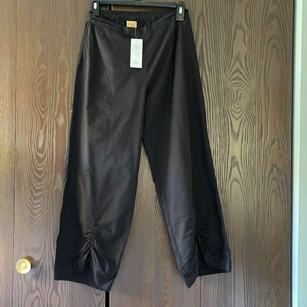 Tulip black, wide legged pants. NWT. Size XS